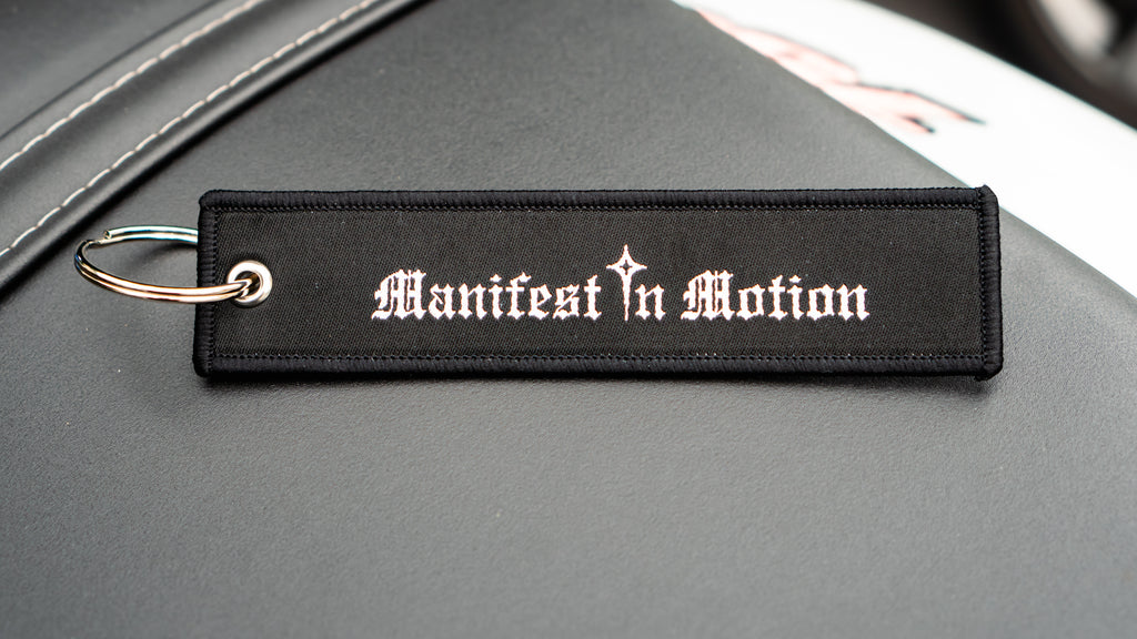 Manifest In Motion Jet Tag