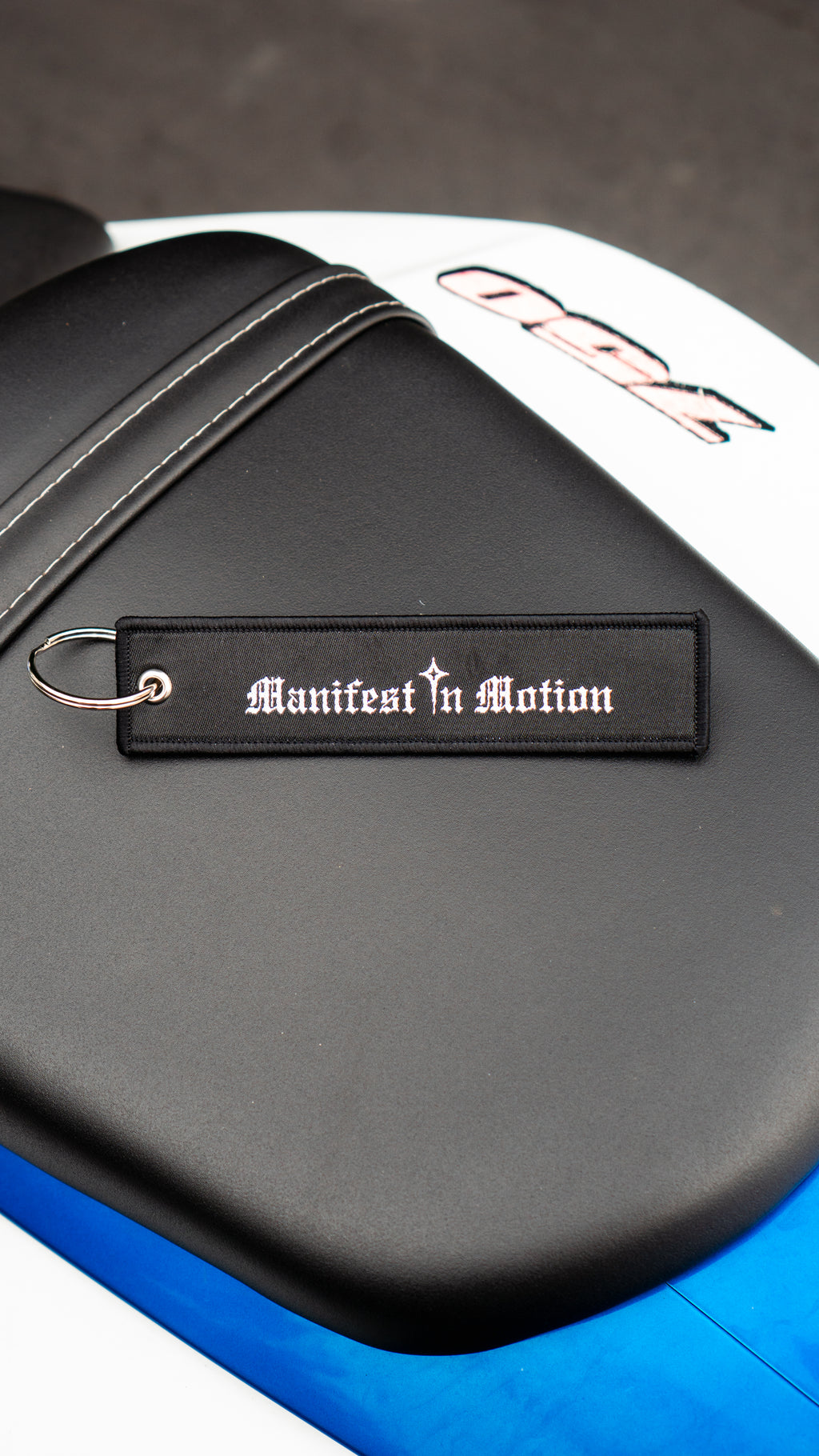Manifest In Motion Jet Tag